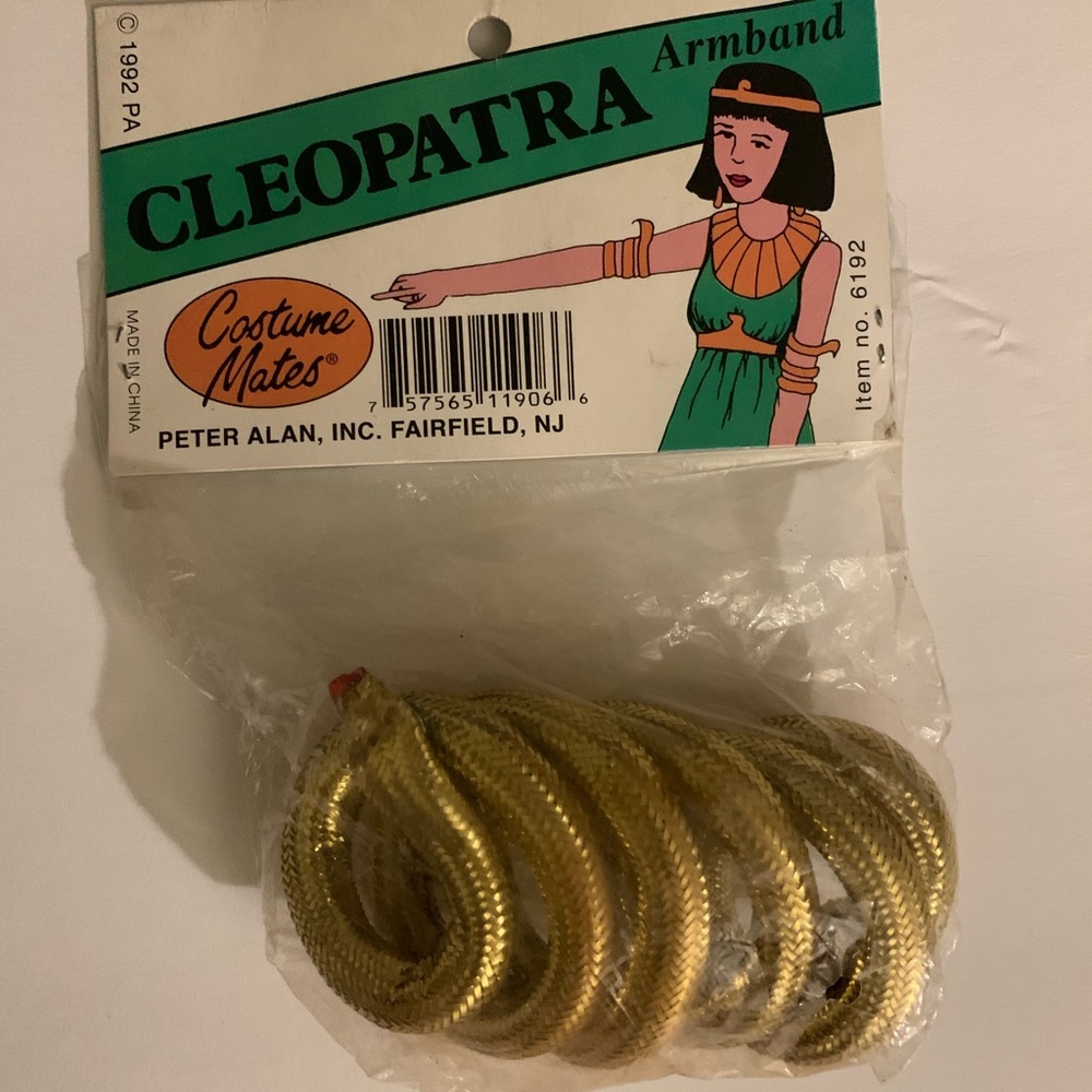 This is a gold cleopatra armband.